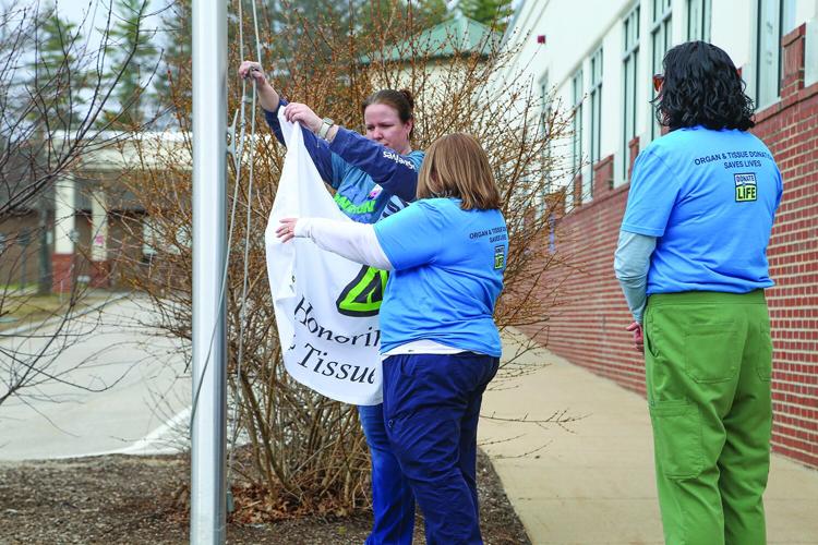 04-10-26 Memorial Donor Flag Raising flag 1