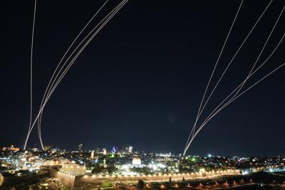An Israeli air defense system fires interceptor missiles at missiles launched from Iran on March 1, 2026.