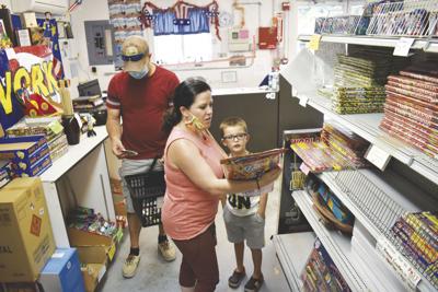 Family looks at fire works