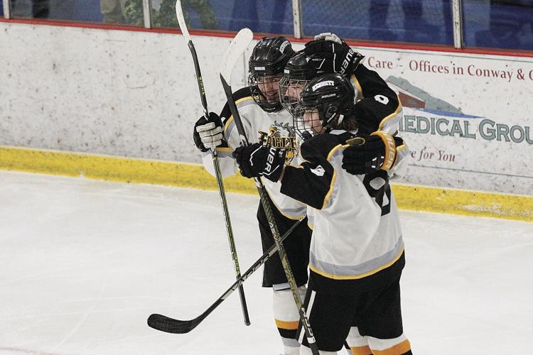 01-21-23 KHS Hockey silvia d goal hugs