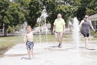 06-07-21 Hot Day boy running wide splash pad