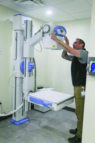 03-09-26 Urgent Care Ribbon Cutting xray vertical