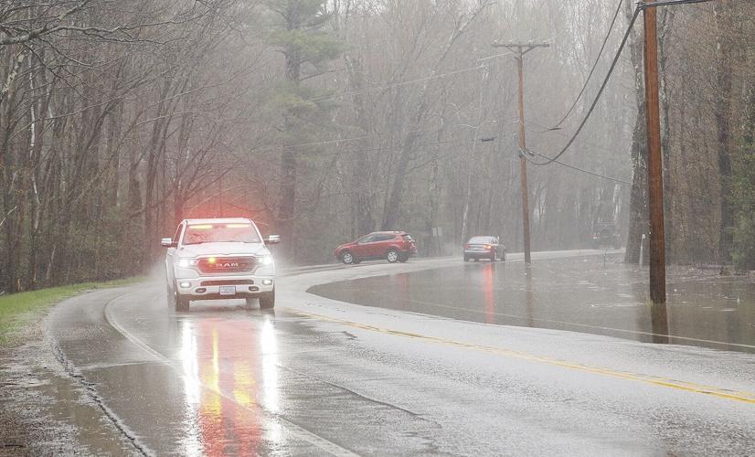 05-01-23 Flooding W Side N semi-wide flashing vehicle