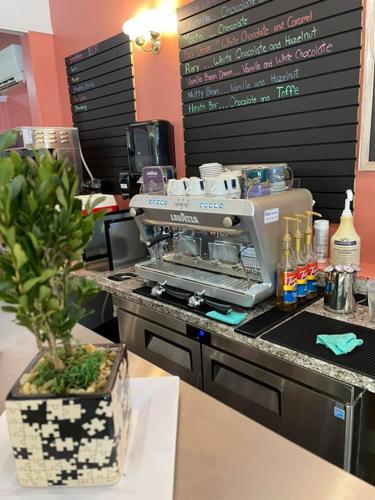 Cafe Italia 3 lavassa machine.jpg