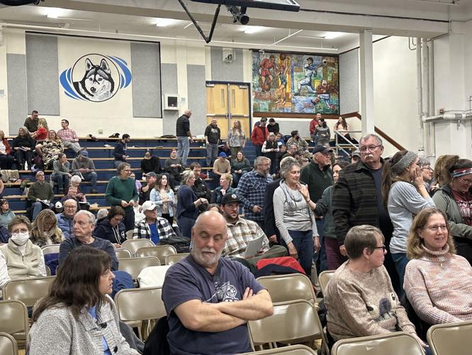 Town meeting voters in Gorham line up to vote