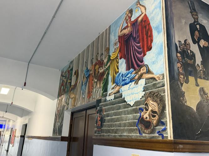 A view of two murals inside the building space of Berlin Elementary School