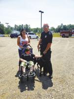 Raising money for K-9 vests is this boy's bliss