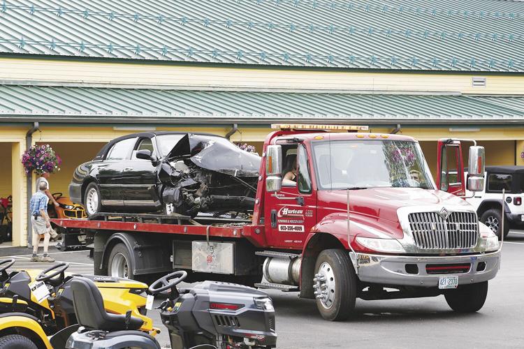 07-01-21 Accident by Lucy black car tow tight