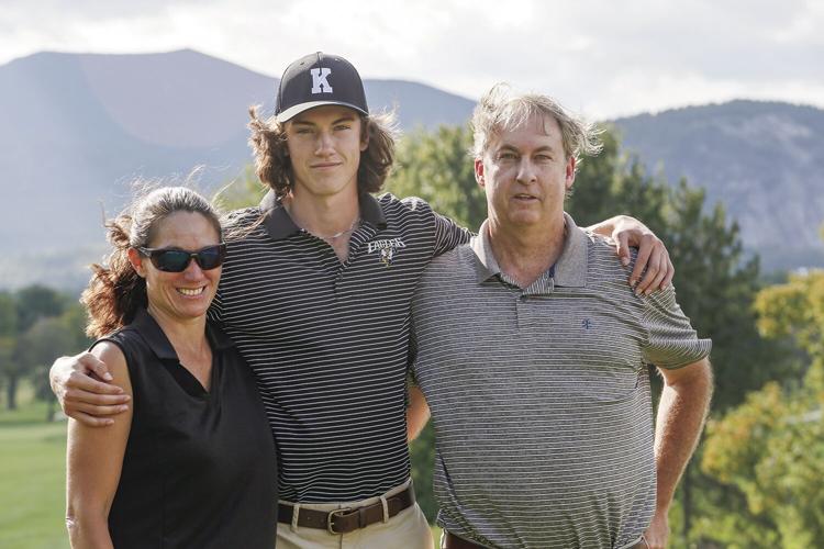 09-14-22 KHS Golf senior with parents
