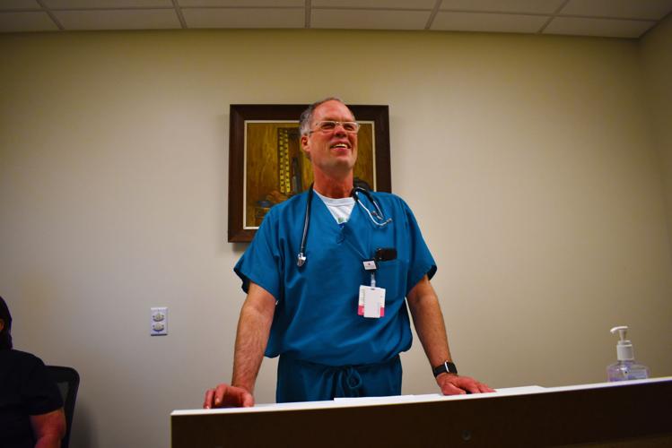 Dr. Angus Badger participates in a telehealth visit.jpg