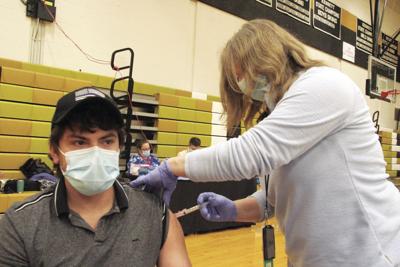 Veteran Todd Nelson gets vaccinated.JPG
