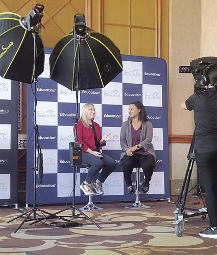 Holly Fougere gets national education award being interviewed