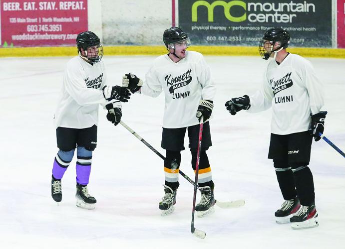 11-29-25 Kennett Hockey Alum fist bumps