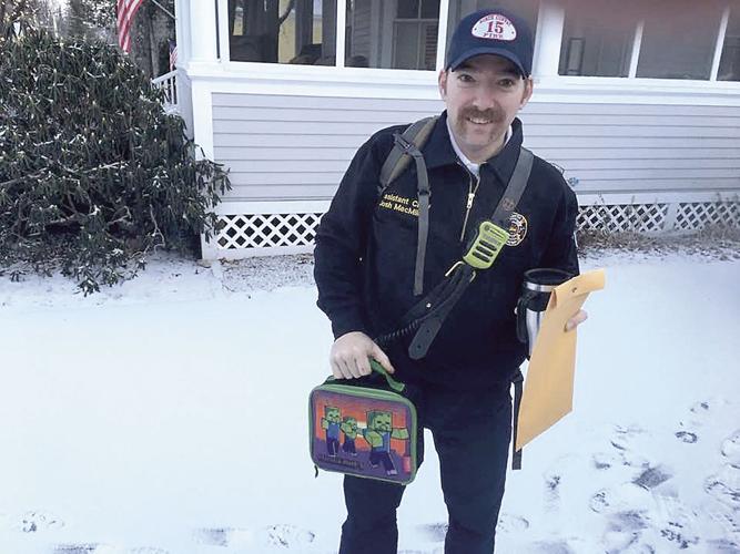 Josh MacMillian new North Conway Assistant Fire Chief with his lunch box