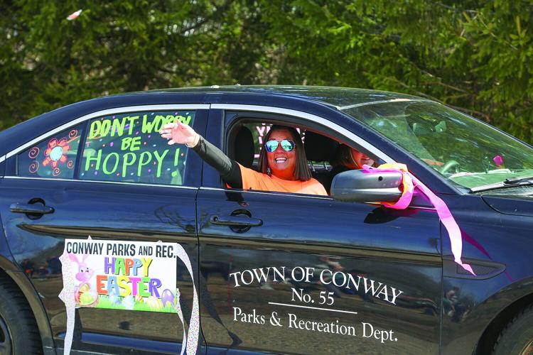 04-04-26 Conway Rec Egg Hunt tossing candy car