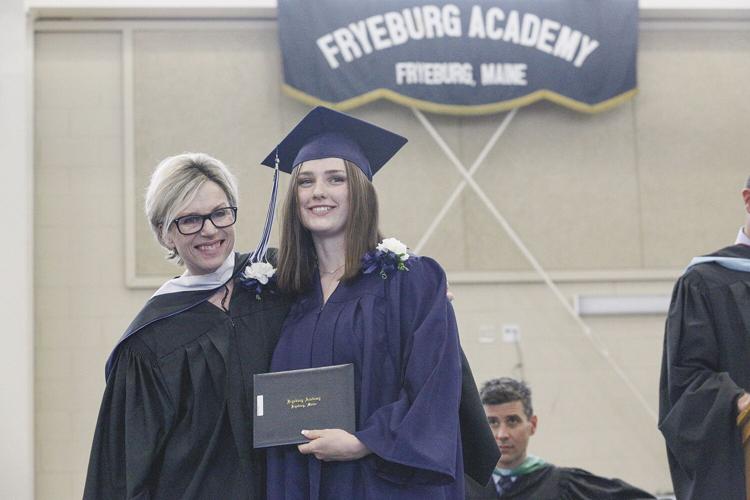 05-28-22 FA Graduation diploma banner behind