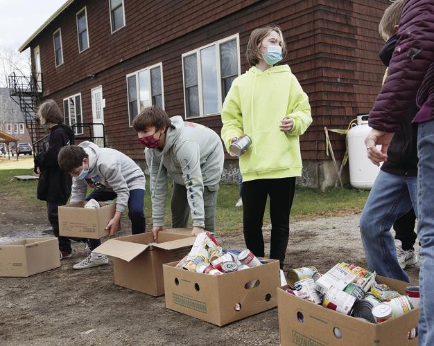 11-19-21 Food March boxes church behind