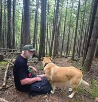 Enjoying the Cabin Trail with Gussie the Chinook