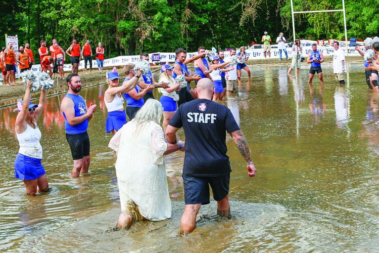 09-06-25 Mud Bowl Wedding walking down aisle
