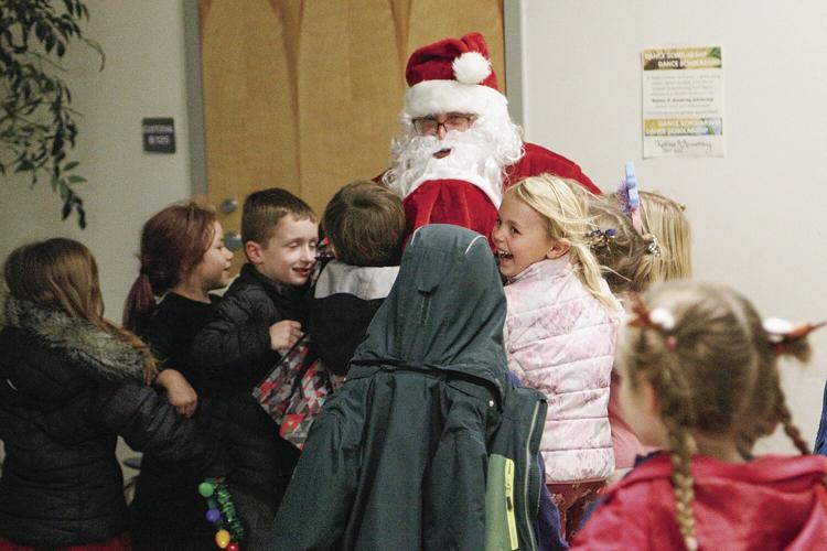 12-17-24 Gingerbread Hunt khs santa hugs