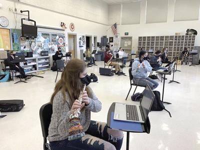 KHS Music returns - students playing intstruments