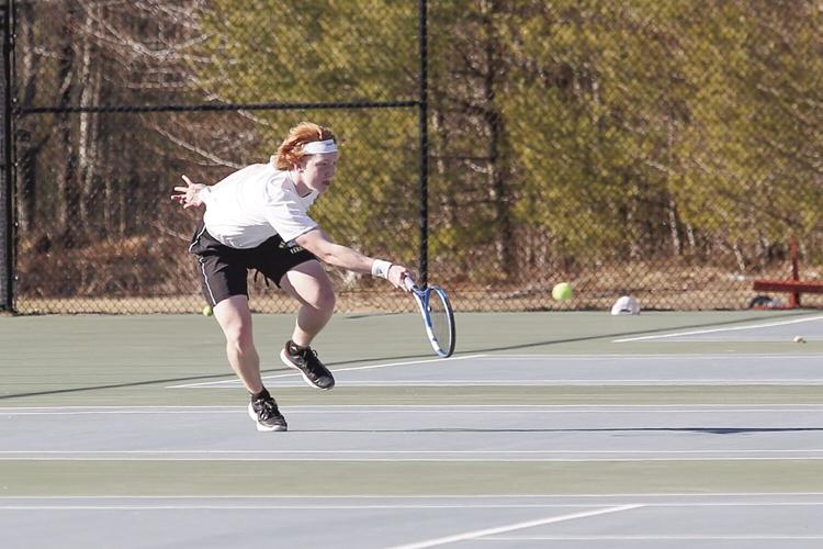 04-10-23 KHS Boys Tennis - Jack Heysler reach
