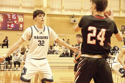 FA Boys Hoop - Hugo Delgado on defenser