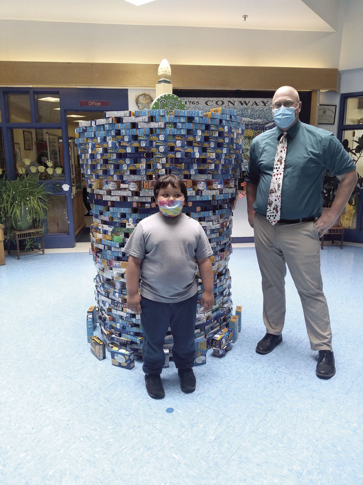 End 68 Hours of Hunger Food Drive - Conway Elementary School Principal and student