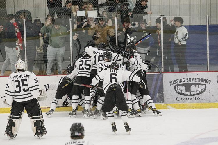 02-21-24 KHS Hockey celebrating win wide 3
