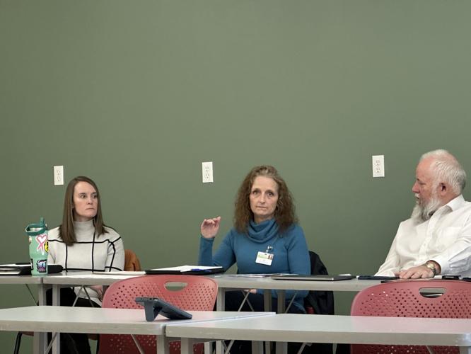 Mackenzie Dorr, Joy Noel and Greg Williams at March 27 coalition in Berlin