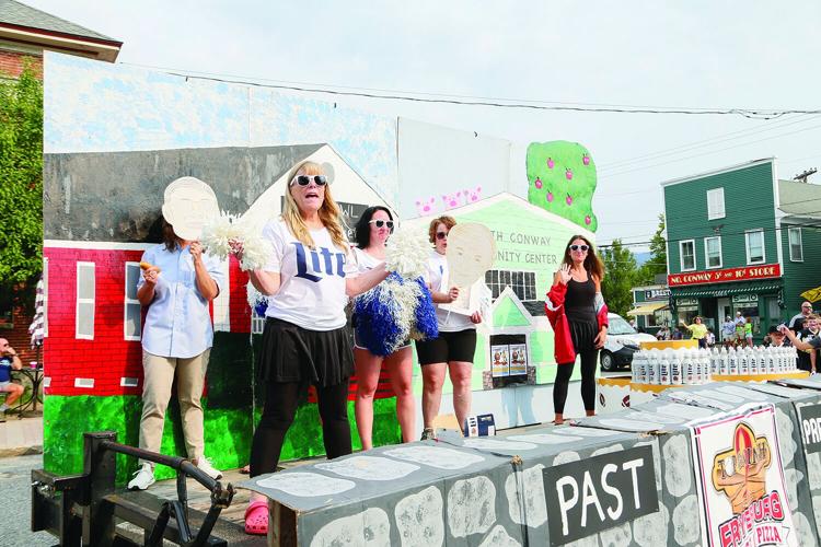 09-06-25 Mud Bowl Parade mudbassadors wave