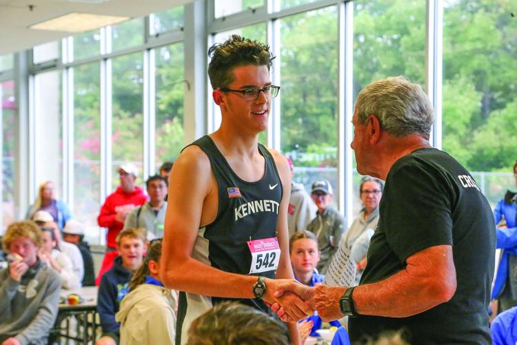 09-26-26 KHS XC seniors fournier handshake