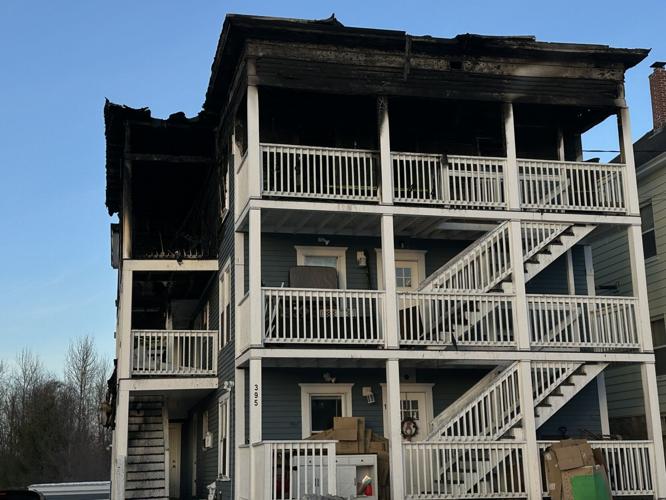 Fire damage to the third floor and roof of 395 Derrah St.