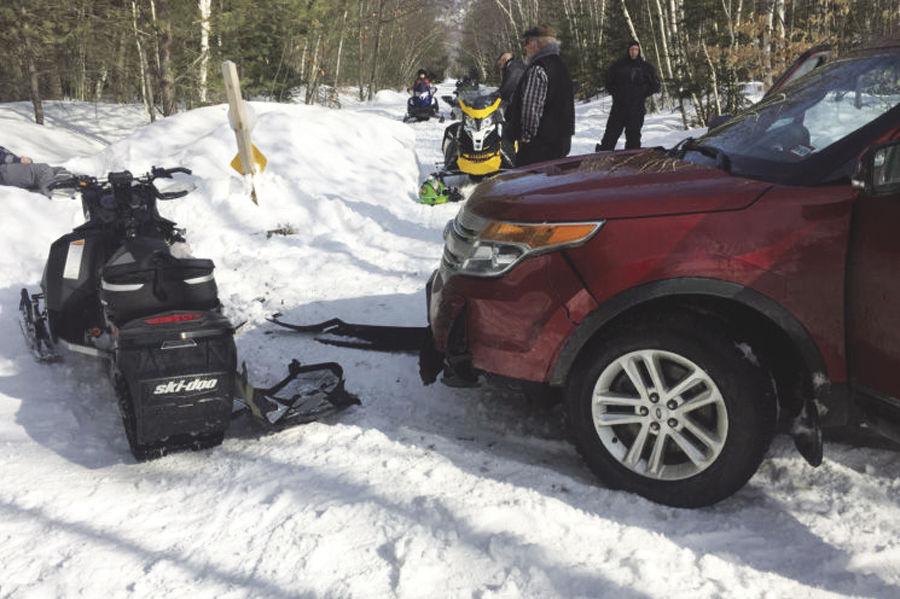 Snowmobile vs. car results in injuries in Gorham