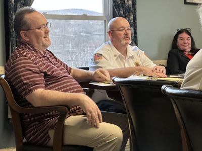 Berlin City Fire Chief James Watkins (center)