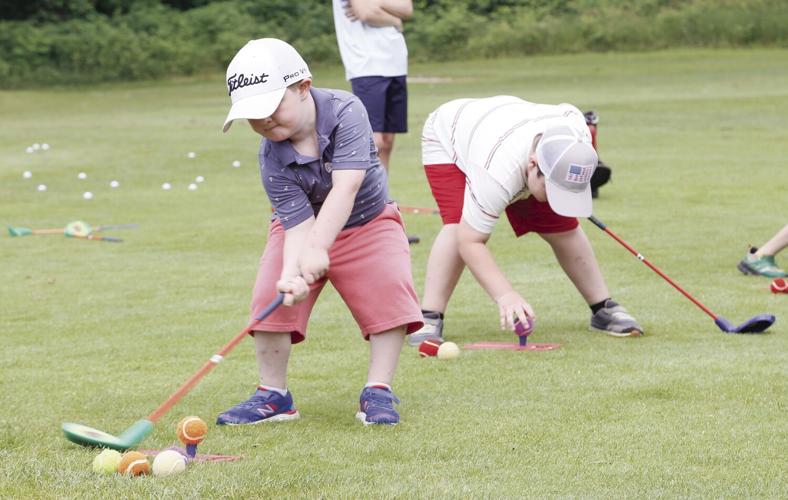 07-13-23 Jr Golf swinging tight