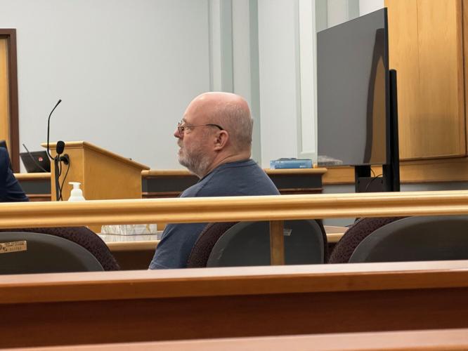 ichard R. Devoid waits inside a Coos County Superior courtroom