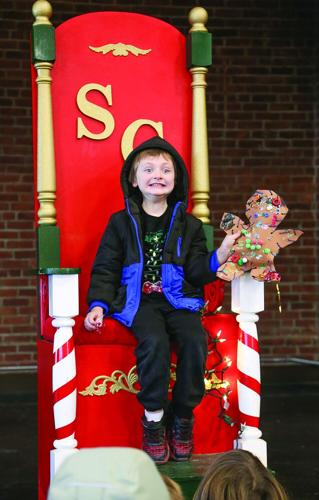 12-18-25 Gingerbread Hunt pose santa chair