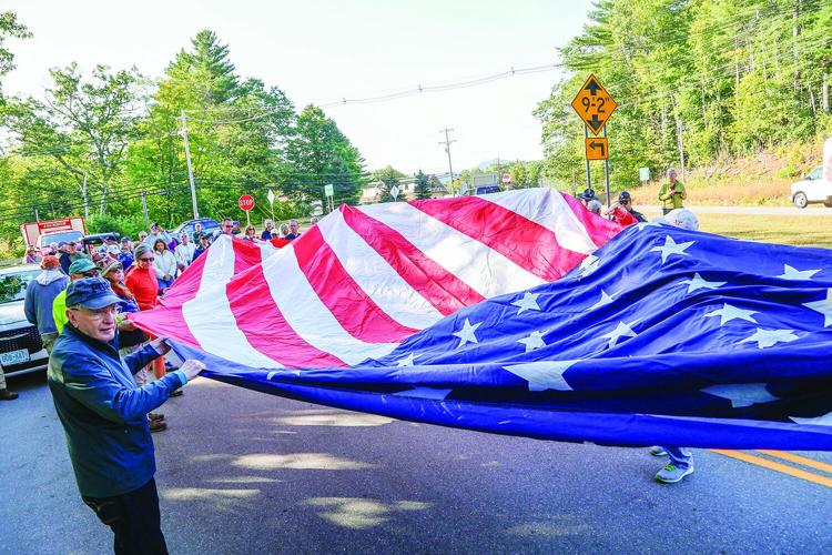 09-11-25 Jackson 911 Walk unfolding flag