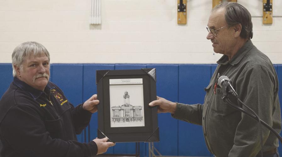 Town government answers questions at town meeting