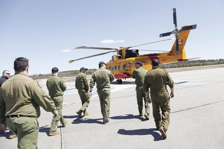05-01-22 Canadian Helicopter walking to helicopter