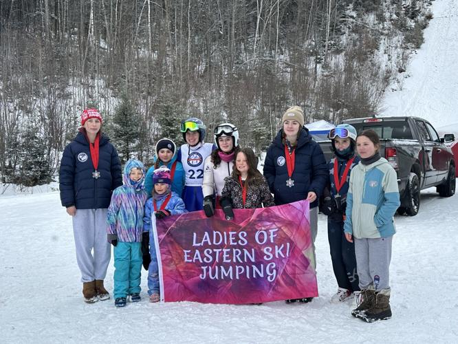 The Ladies of Eastern Ski Jumping gather for a photo