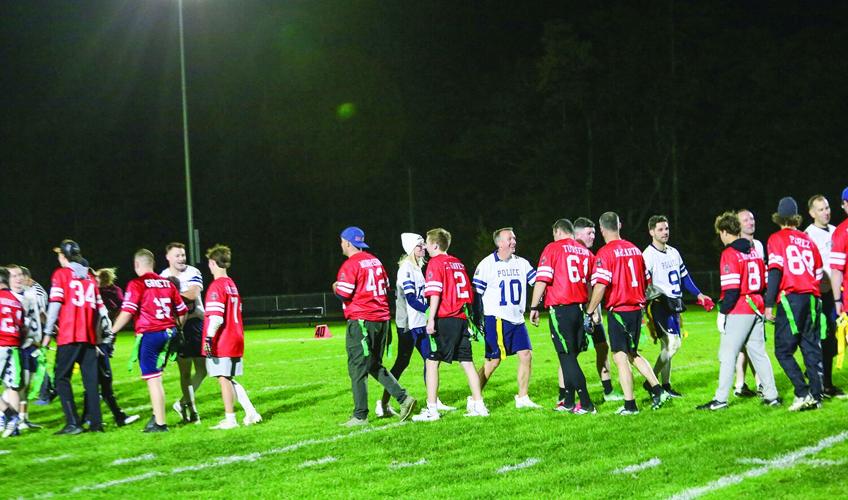 10-14-26 Battle of Badges FB high fives