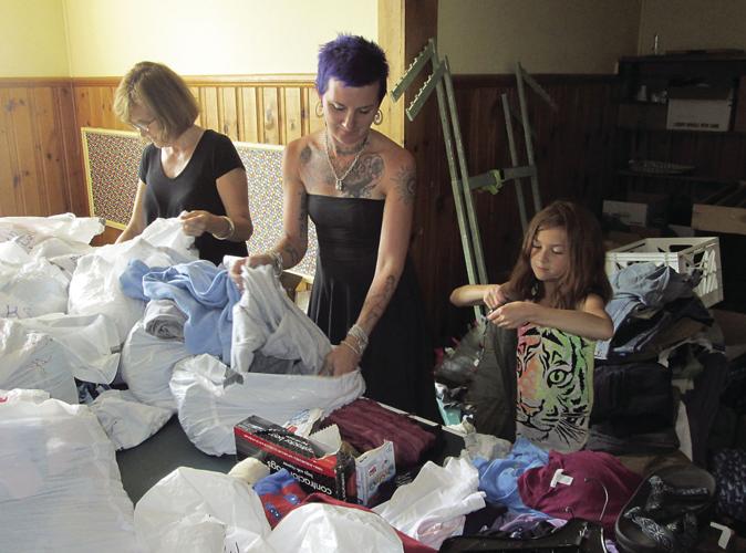 7-13 Holly Sare with Emily Smith-Mossman and daughter Nico Mossman age 9 at Revolving Closet.jpg