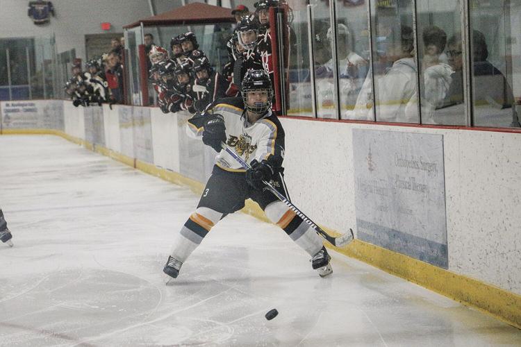 12-14-22 KHS-Berlin Hockey laughland by boards