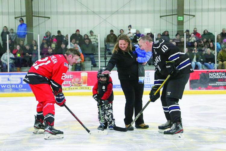 03-23-26 Battle Badges Hockey puck drop 1
