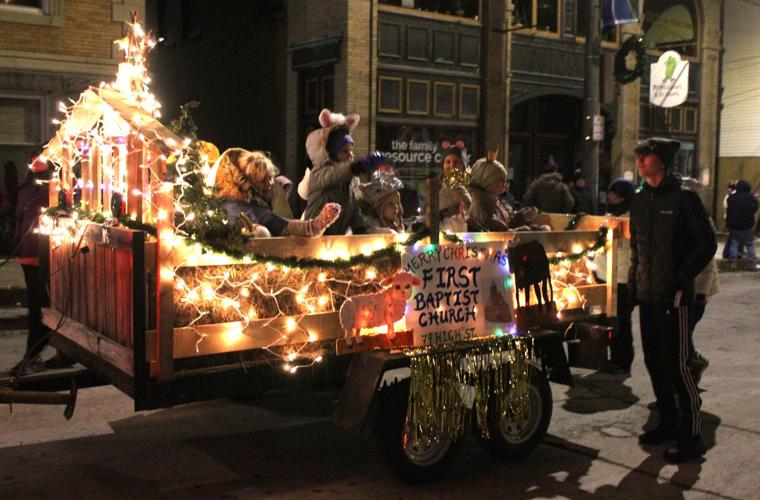 A float from First Baptist Church makes its way down Main Street