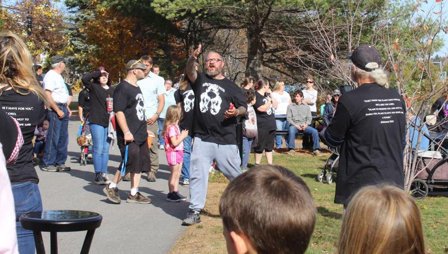 James Cowan Jr. (center) speaks about the Coos County Recovery Walk