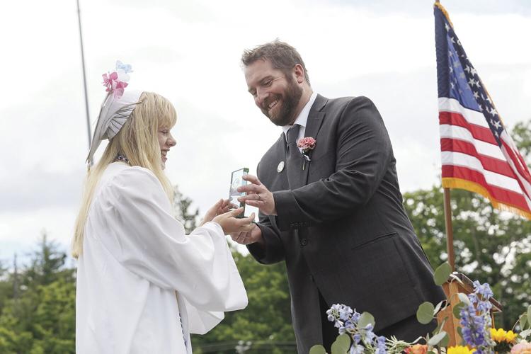 06-08-24 KHS Grad principals award walcott handshake