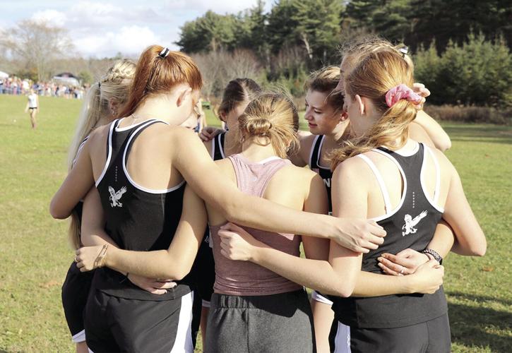 KHS cross-country girls at the meet of champions - huddle